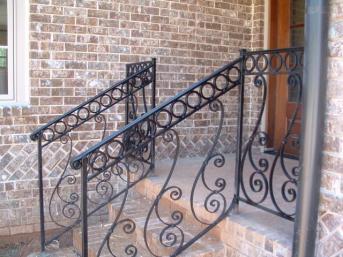 Custom wrought iron rails - scrolls and rings