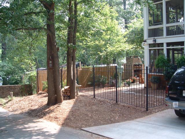 Wrought iron fence to keep children and pets in the yard and out of the street