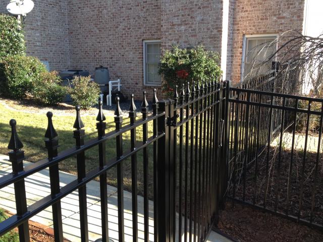 3-rail style Wrought Iron Fence and gate with finials