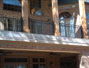 "Before" picture before Wrought Iron Rail with patterned finial split rail
